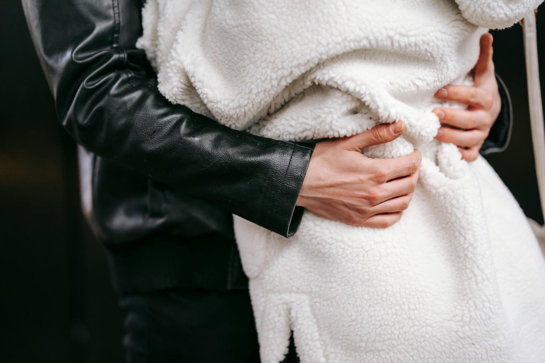 couple in casual clothes embracing each other