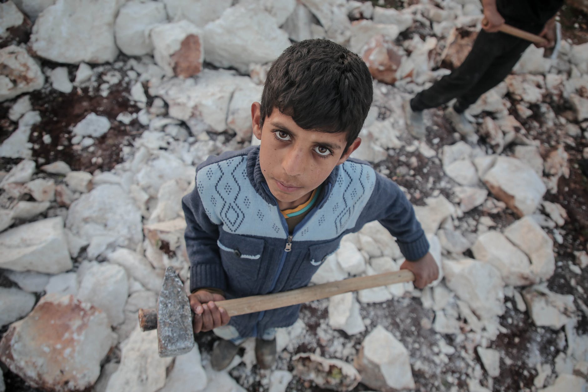 little boy working at mine